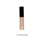 Cosmetic lip-gloss with black cap on a white background, text Its all about me below.