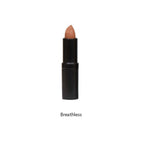 Lipstick with black casing and beige shade on a white background