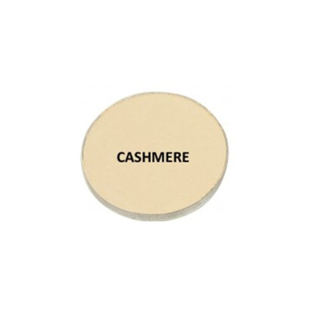 Round beige compact with 'CASHMERE' text on a white background