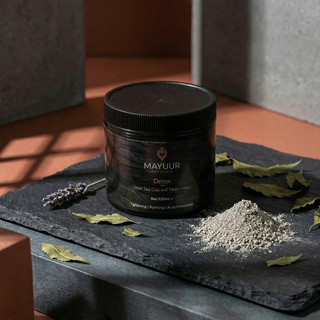 Mayuur Detox product on a dark surface with green leaves