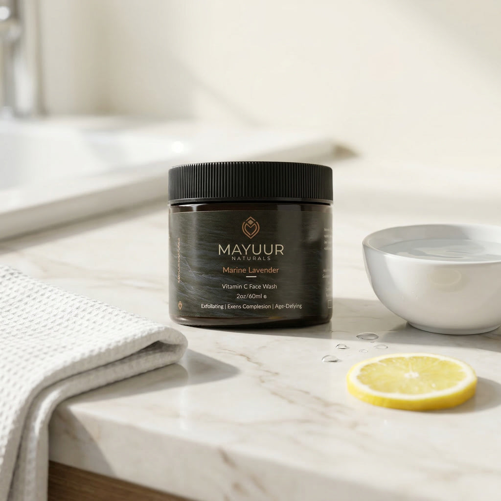 Mayuur Naturals jar on a bathroom counter with a lemon slice and towel