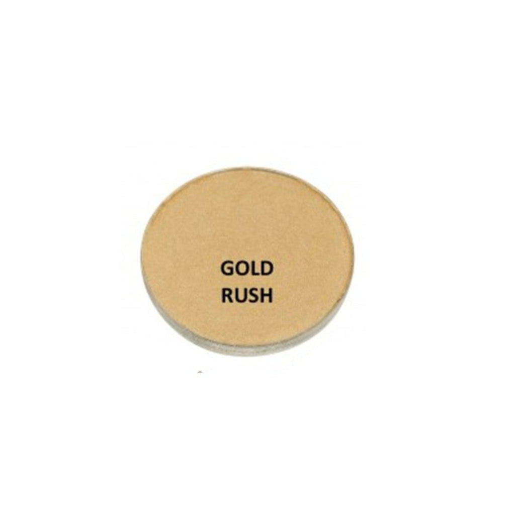 Round beige compact with 'Gold Rush' text on a white background