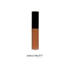 Cosmetic lip-gloss with black cap on a white background, text 'Jealous Much??' below.