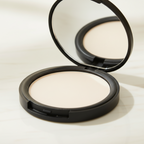 Compact powder with mirror on a light background