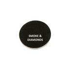 Black round product with 'Smoke & Diamonds' text on a white background