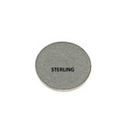 Round gray object with 'STERLING' text on a white background