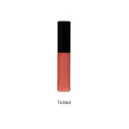 Cosmetic lip-gloss with black cap on a white background, text Tickled below.